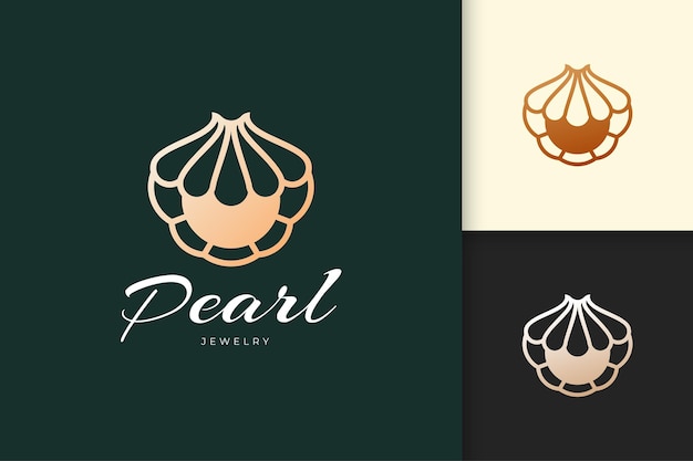 Luxury shell or clam logo with pearl gem for jewelry or beauty brand