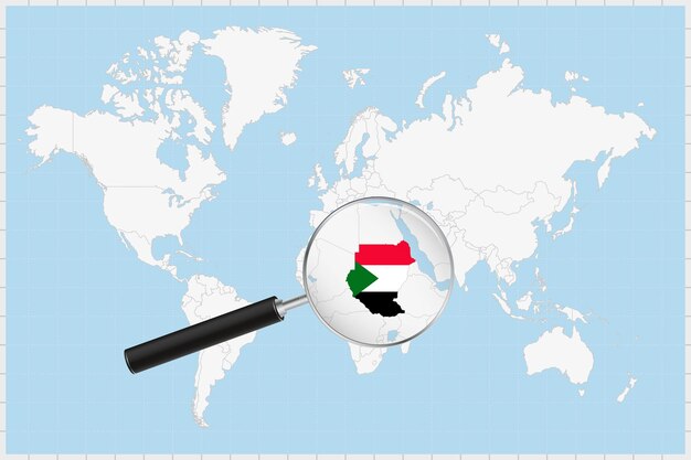 Magnifying glass showing a map of sudan on a world map