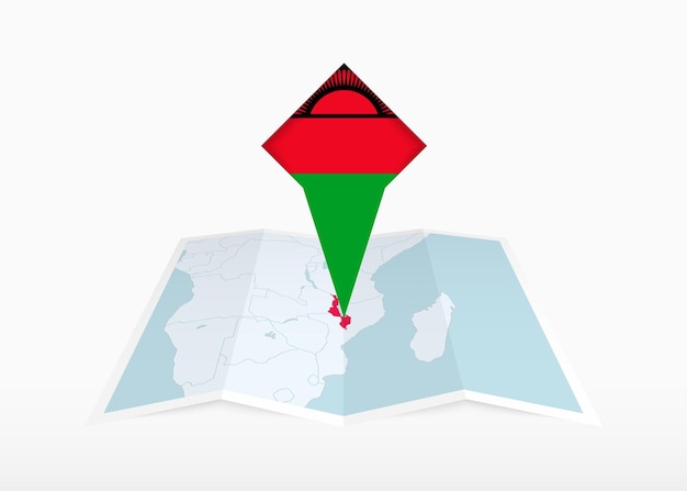 Malawi is afgebeeld op een gevouwen papieren kaart en een vastgezette locatiemarkering met de vlag van Malawi.