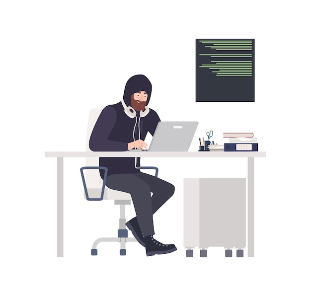 Хакер-мужчина в черной одежде сидит за столом, взламывает компьютер и крадет личную информацию