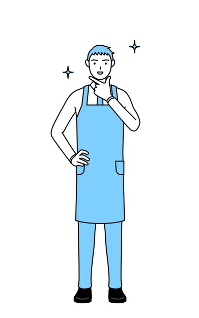 A man in an apron in a confident pose