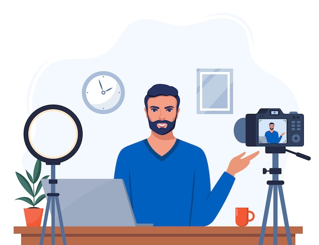 man blogger records himself on video using a camera and a circle light lamp