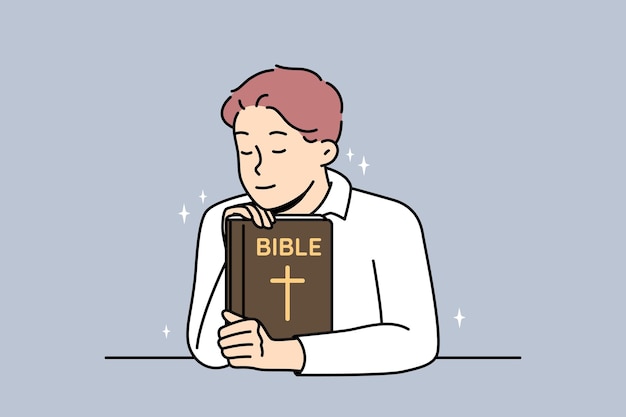 Мужчина-христианин держит библию, молится богу, чувствует благодать