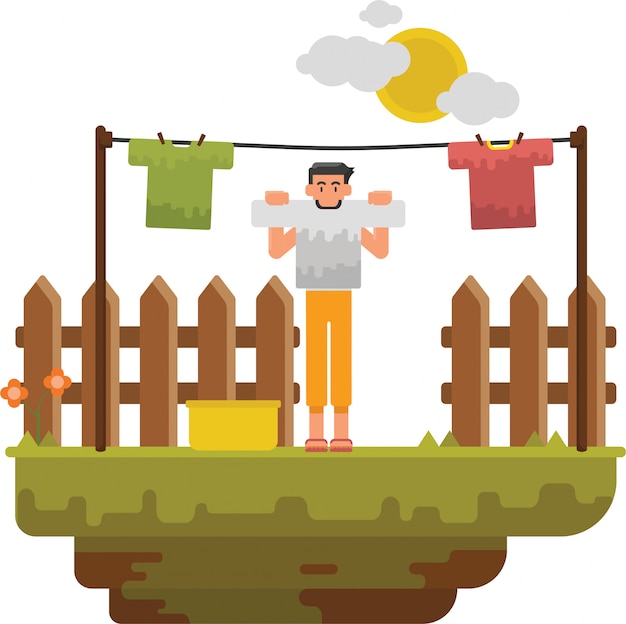 A man doing his laundry and hang it on the yard