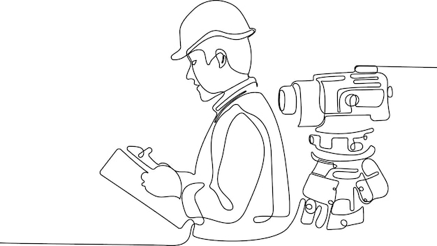 A man in a hard hat is reading a book with a hammer on the back of it.