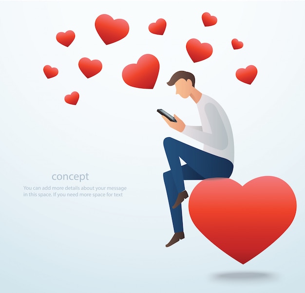 man holding smartphone sitting on the red heart