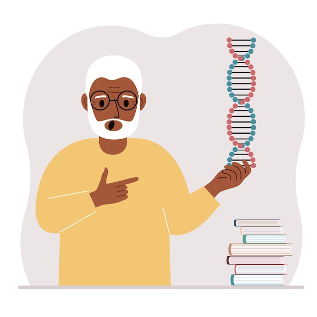 A man holds a DNA model in his hand and there are many books nearby