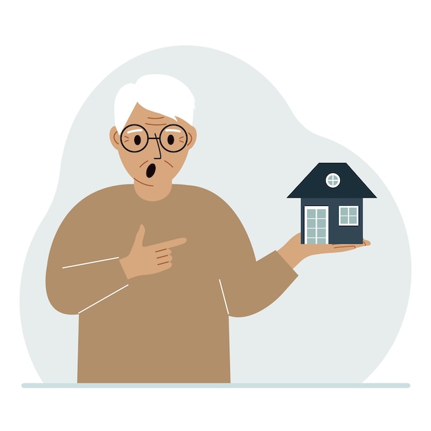 Мужчина держит в ладони небольшой дом. Концепции наследования недвижимости, передачи ипотечного кредита или покупки дома.