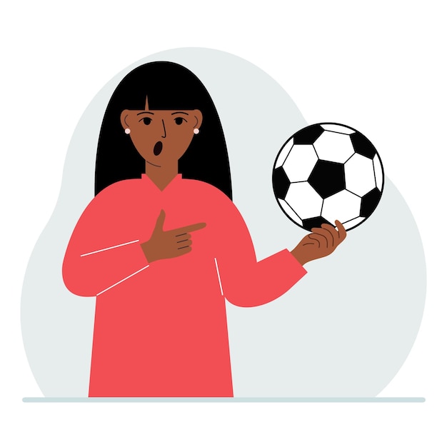 A man holds a soccer ball in his hand The concept of a player fan or coach