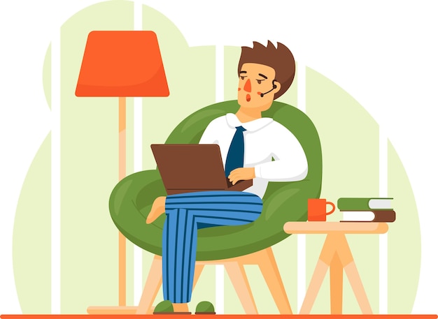 Man in casual outfit zit thuis in een comfortabele fauteuil en bladert of werkt op een laptop op zijn schoot.