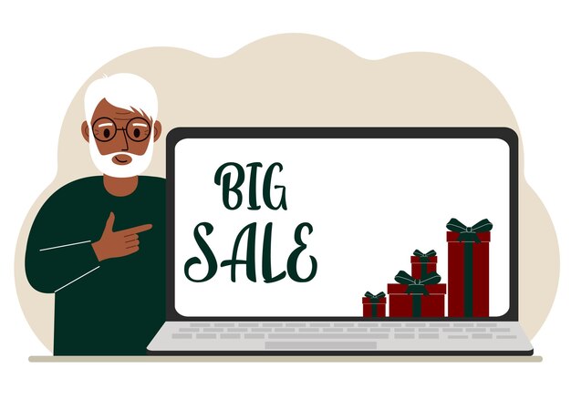 A man next to a large laptop on his screen the text of big sales and a lot of gift boxes