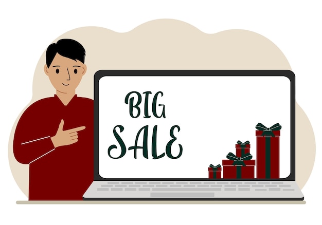 A man next to a large laptop on his screen the text of big sales and a lot of gift boxes