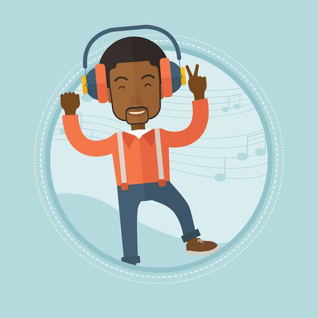Man listening to music in headphones and dancing