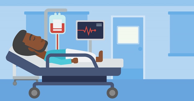 man lying in hospital bed.