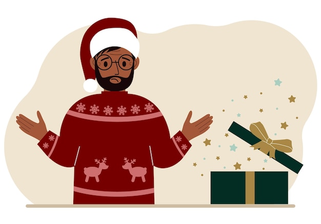 겨울 휴가를 위한 열린 크리스마스 또는 새해 선물 선물 상자 근처에 있는 남자