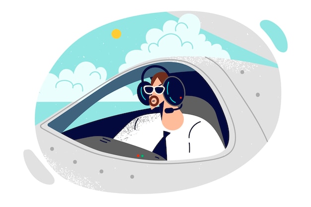 man pilot of airplane sits in cockpit of airliner flying in sky among clouds making crossborder flight guy aviator in headphones and sunglasses works as pilot and controls civil ship