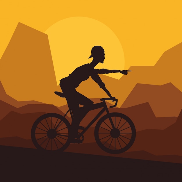 Man riding bike and mountain background
