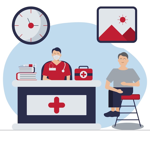 A man sits in front of a table with a red cross on it.