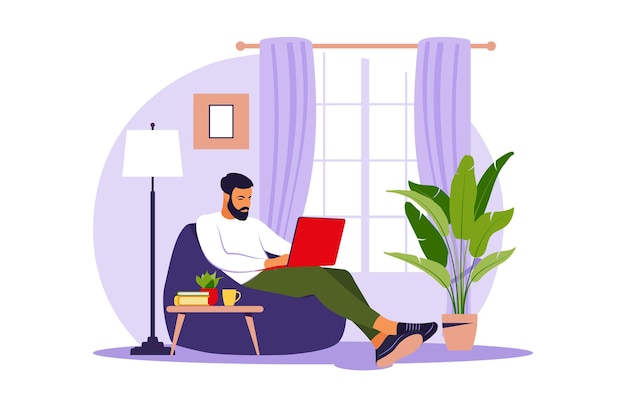 Vector man sitting with laptop on bean bag chair