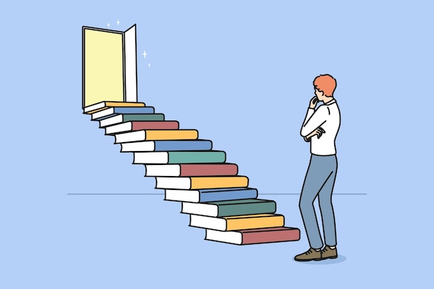 Man standing near stairs made of books