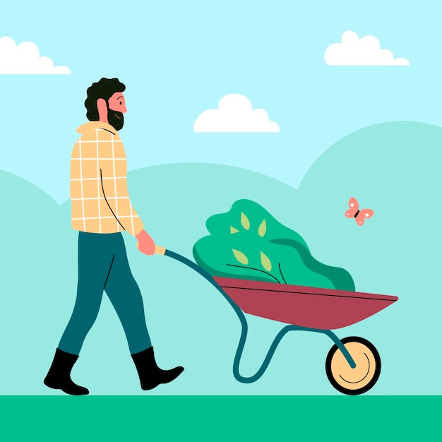 A man in a wheelbarrow carries a seedling for planting