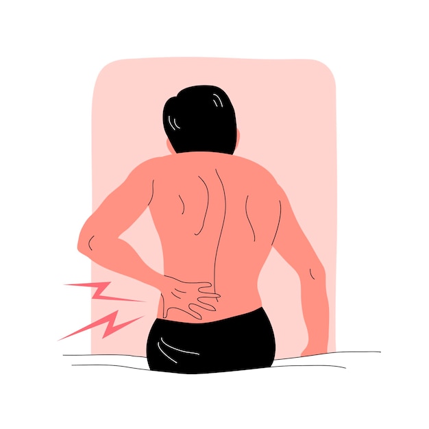 a man with back pain sits on a bed