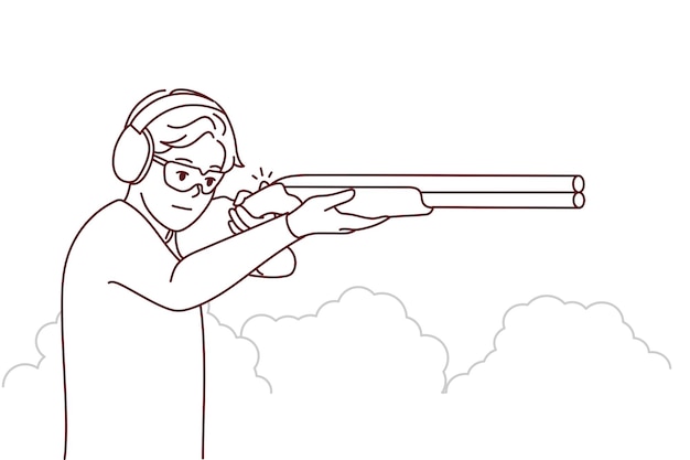 Man with rifle shooting outdoors