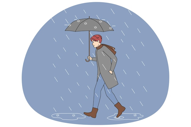 빗 속에서 걷는 우산을 가진 남자