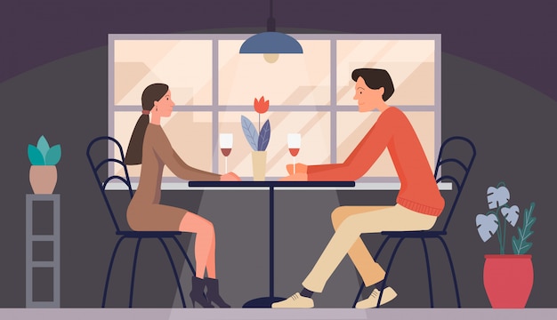 Man and woman on date in restaurant. Meeting love couple