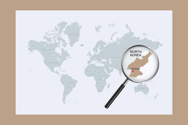 Map of North Korea on political world map with magnifying glass