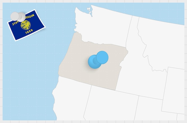 Map of oregon with a pinned blue pin pinned flag of oregon