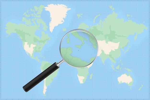 Map of the world with a magnifying glass on a map of Malta.