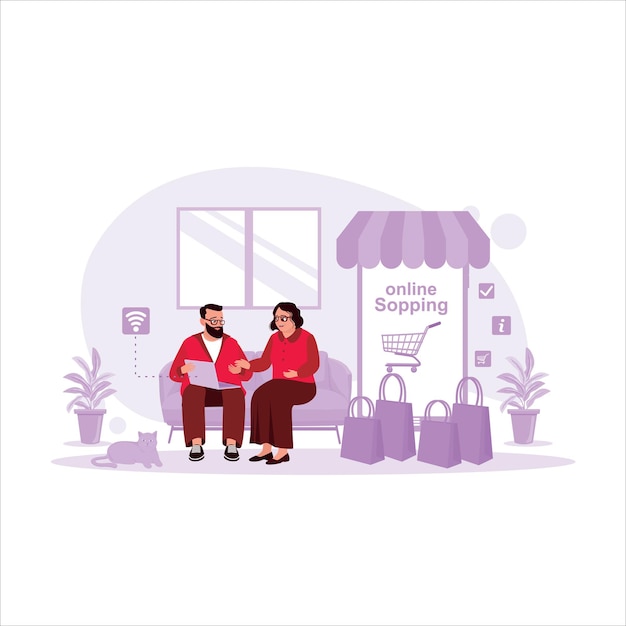 Married Couple Shopping Online On Laptop With Colorful Shopping Bags On Sofa online shopping concept