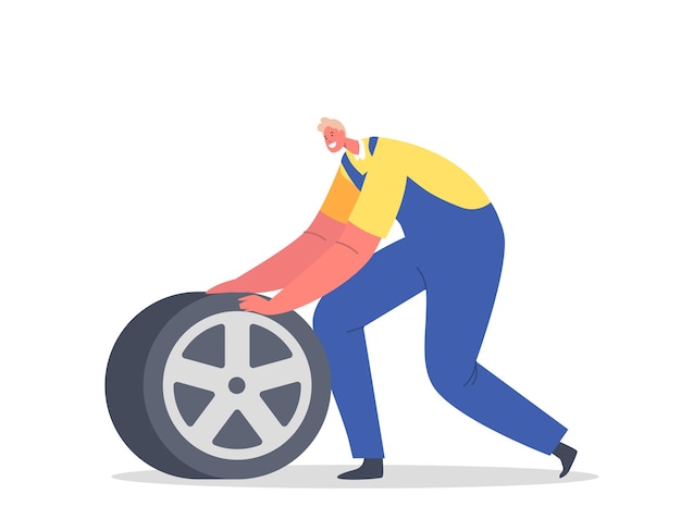mechanic dressed in blue overalls rolling car wheel isolated on white background repair service staff check auto