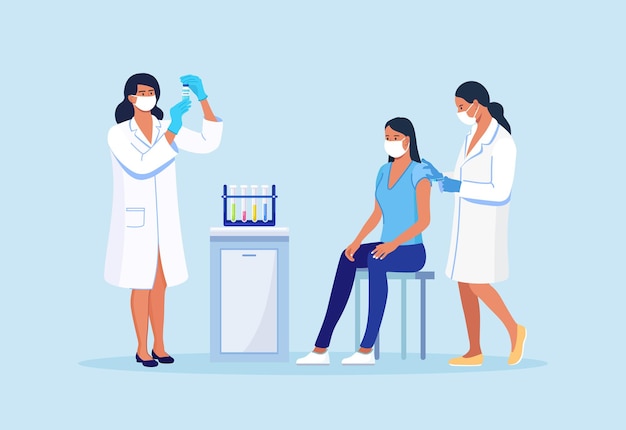 Medical doctor in protective facial mask, gloves injecting a patient, giving a coronavirus vaccine to woman. People vaccination for immunization against covid-19