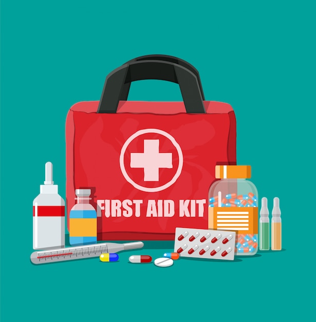 medical first aid kit with pills and thermometer