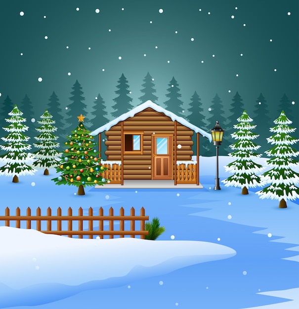 Mening van sneeuwblokhuis en kerstboomdecoratie