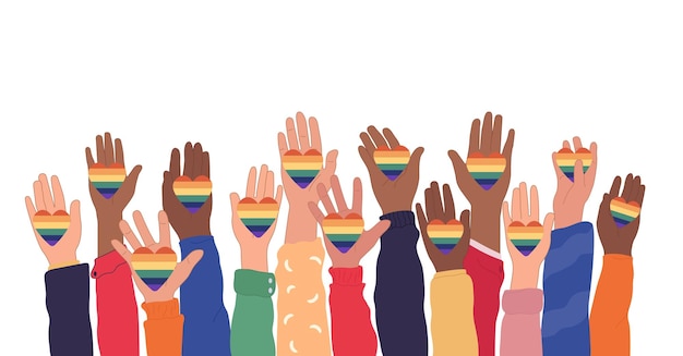 Menselijke handen houden transgender- en lgbt-vlaggen van de regenboog vast tijdens de viering of parade van een trotse maand of dag
