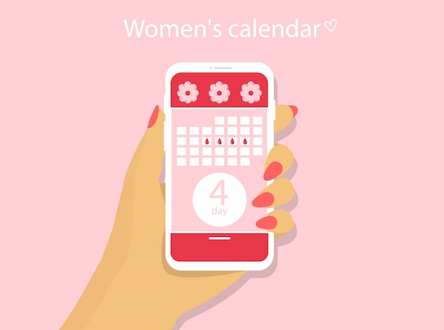 Menstruele kalender. aanvraag voor een telefoon met een vrouwelijke kalender. een hand houdt een telefoon vast.