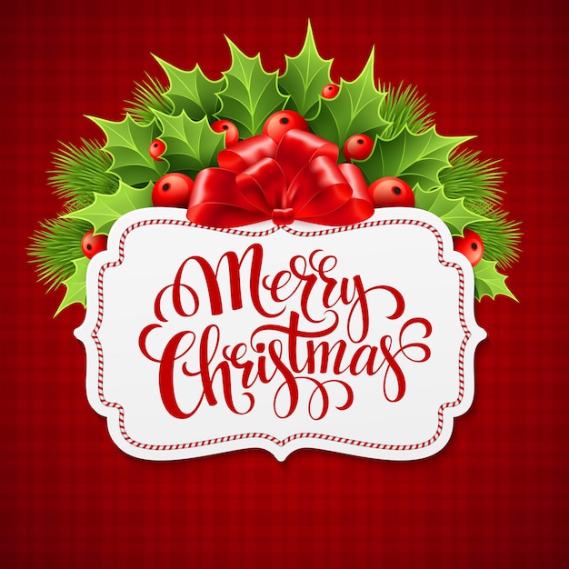 Merry christmas belettering kaart met hulst, wenskaart