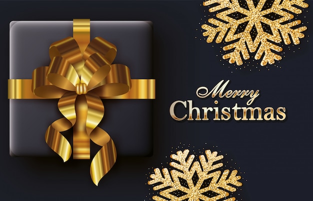 Vector merry christmas calligraphy card with gift and golden ribbon