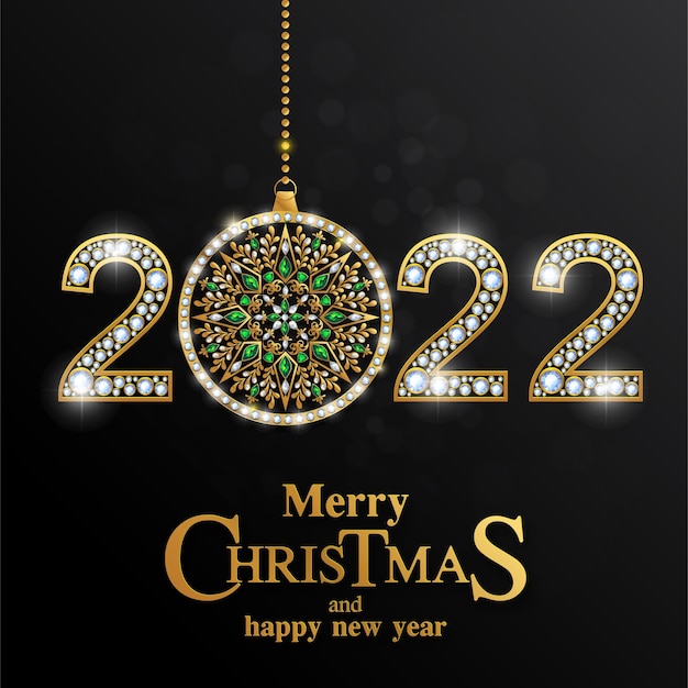 Buon natale e felice anno nuovo 2022 con fantasia oro e cristalli su carta color.