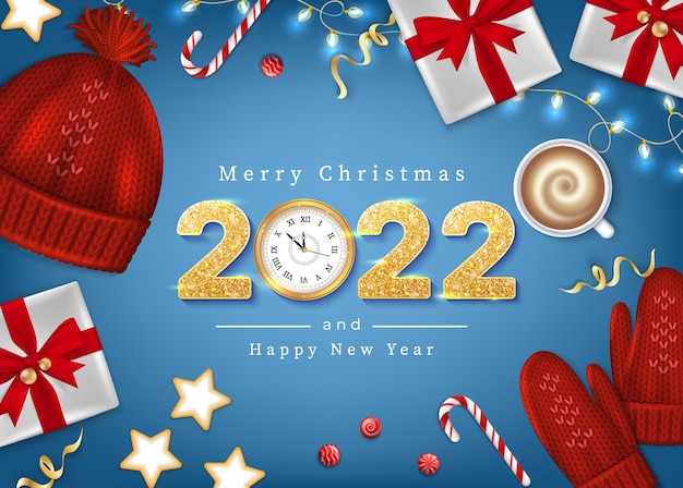 Поздравительная открытка с Рождеством и Новым годом Зимние элементы еловые ветки вязаная синяя шапка
