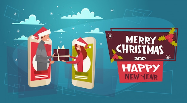 Vector merry christmas and happy new year poster with couple giving gift box through cell smartphone screen