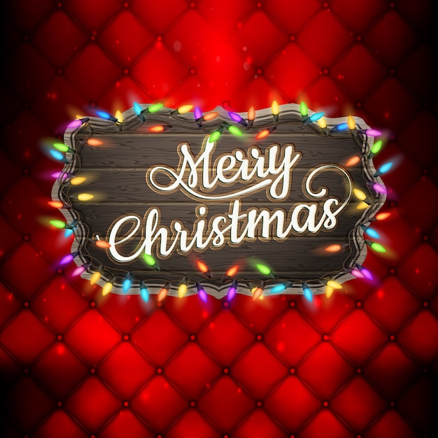 Merry christmas lettering with garland lights.