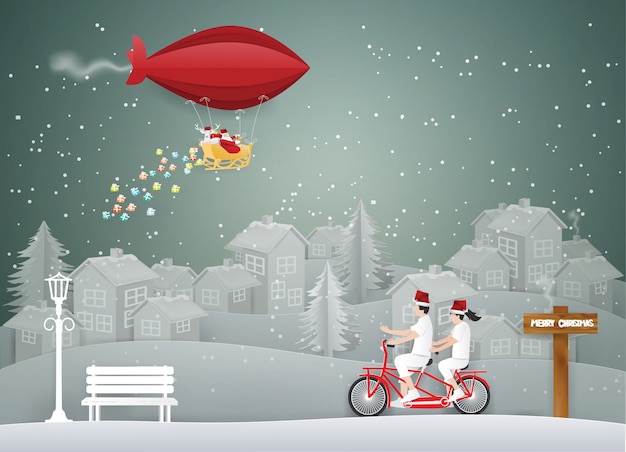 Вектор Счастливого рождества с санта-клаусом на красном воздушном шаре в небе