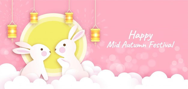 Mid autumn festival banner with cute rabbits and the moon in paper cut style.