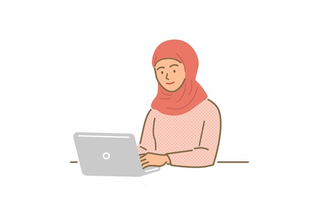 PCの前で微笑む中東の女性