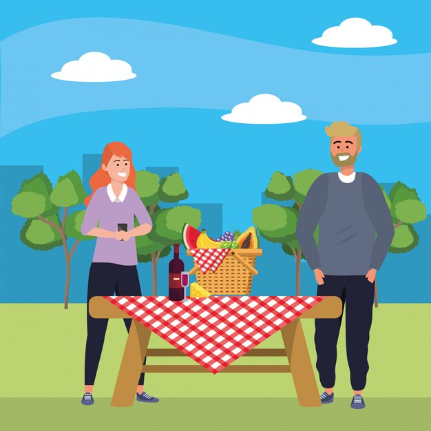 millennial couple smartphone taking selfie picnic