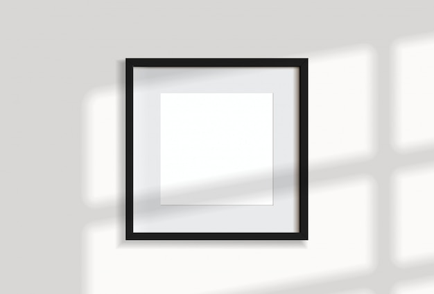 Minimal empty square black frame picture   hanging on white wall  with window light and shadow. isolate   illustration.